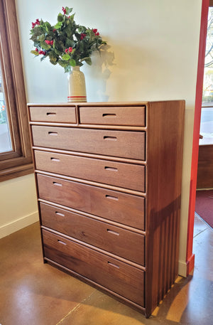 7 drawer dresser with finger groove drawer pulls. Mahogany wood with Mahogany Wash. Handmade locally in Culpeper, Virginia.