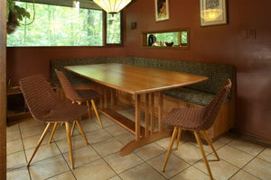 Arts & Crafts Banquette Table features a trestle base, seats up to 8 people, chic dining room style family-sized furniture