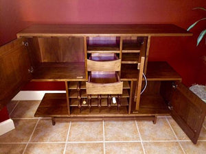 Mid Century Wine Cabinet features a modern entertainment furniture in assorted solid hardwoods and finishes Made in America