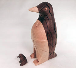 Chapman Puzzle Penguin in Black Walnut and Maple made at Hardwood Artisans in Bethesda, Maryland
