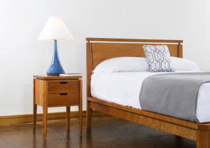 Susan Nightstand shown with matching bed set is a space saving bedroom furniture design by Hardwood Artisans near Burke VA