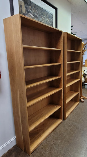 Two cherry basic bookcases with 4 adjustable and 1 fixed shelf made by Hardwood Artisans in Reston, VA