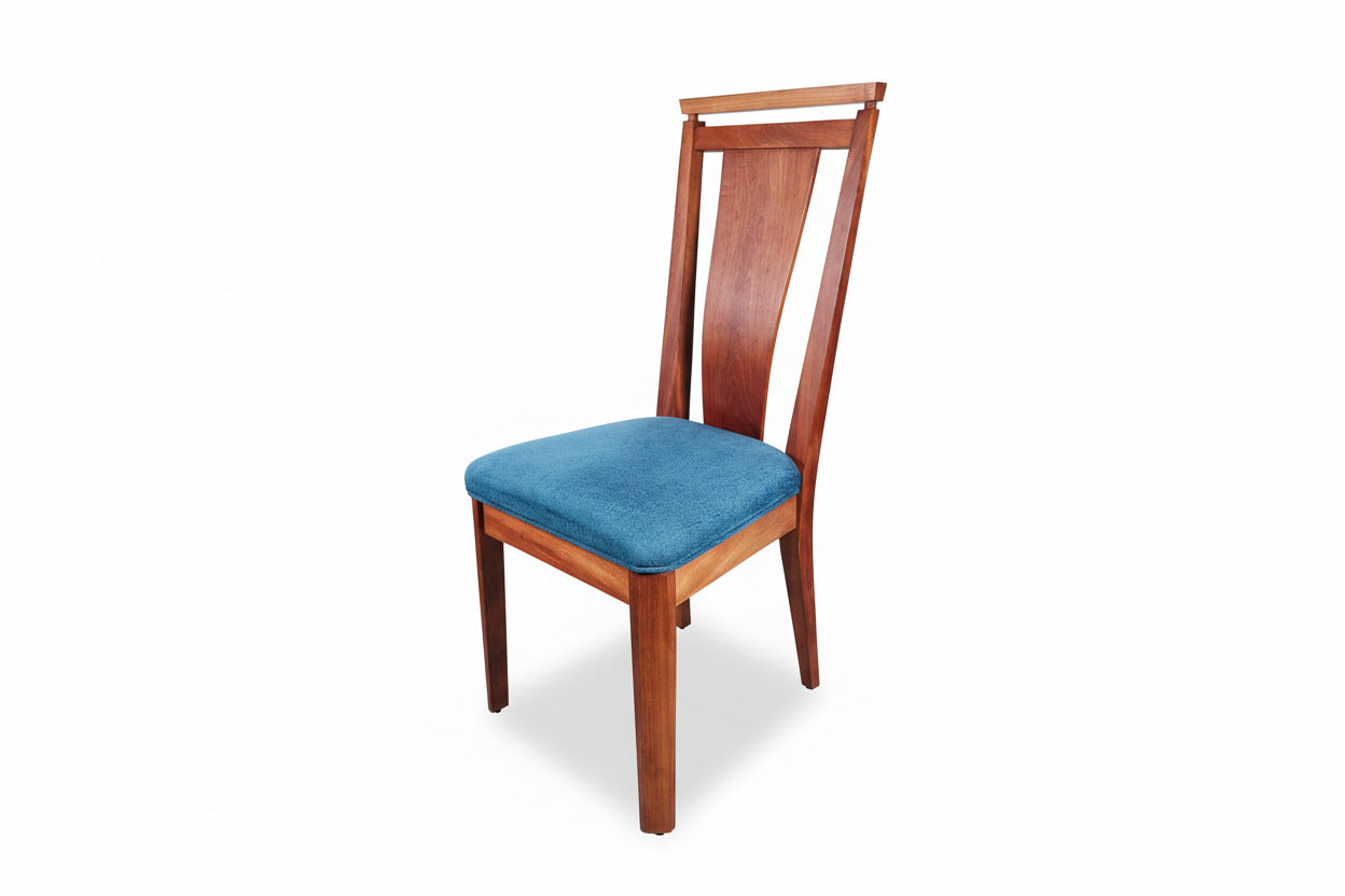 Wooden chair with a blue cushion on a white background