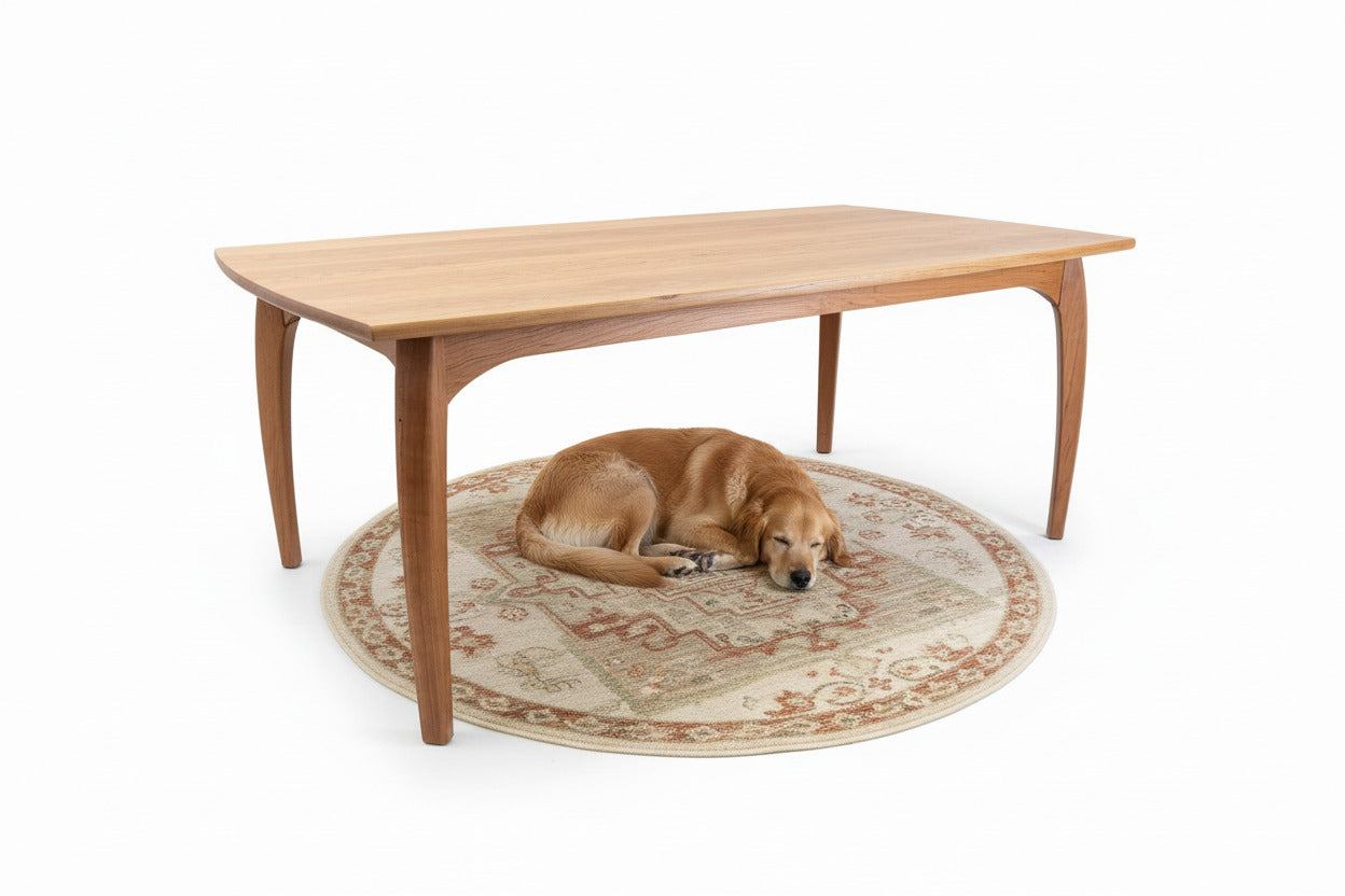 Wooden dining table on a white background