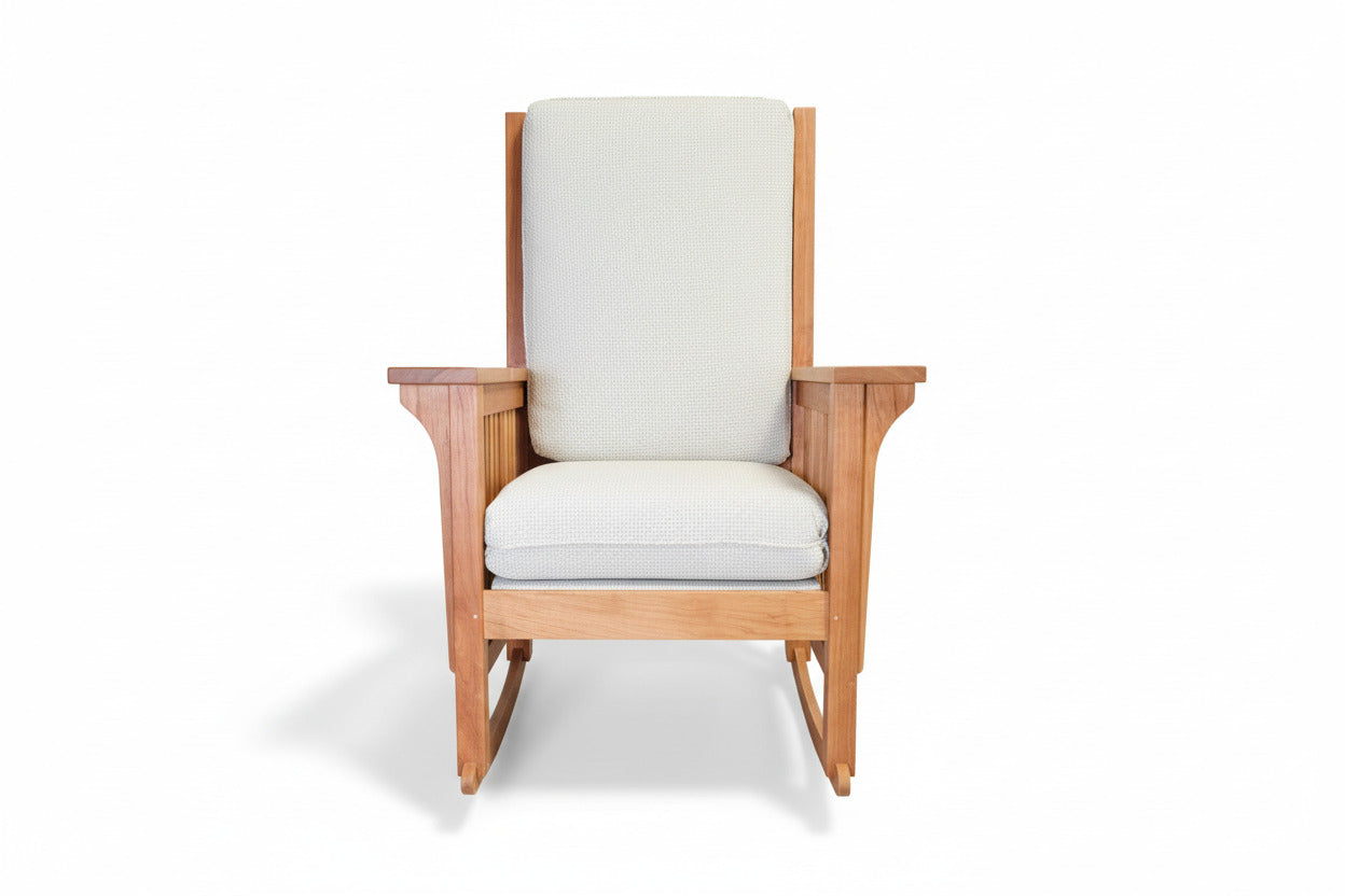 Solid cherry rocking chair with slats and light blue fabric made in Charlottesville, VA