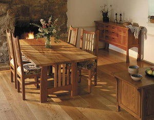 Highland Table shown with Highland Chairs and Huntboard in Natural Cherry w/ Contrasting Accents is a family-sized dining set