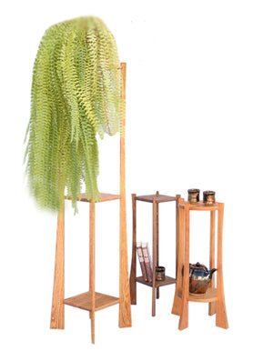 Plant Stands grouped together displays our unique and custom tall or short indoor handmade table pieces for multiple plants