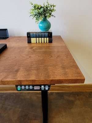 Sit-Stand Adjustable Desk shown in Cherry with Mahogany Wash is a beautiful addition to your workspace. Hand crafted at Hardwood Artisans in Culpeper, Virginia