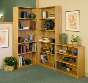 Basic Bookcase in Natural Cherry by Hardwood Artisans is shown with added tall & short bookcase pairs nicely in any setting
