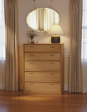 Contemporary 5-Drawer Chest Dresser shown in home setting displays a modern style quality made to last bedroom furniture item