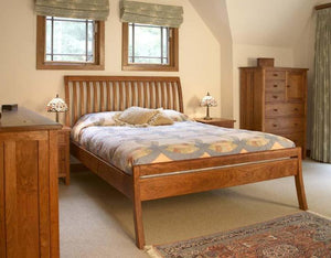 Artisan Sleigh Bed Curved Legs with Craftsman Armoire and Craftsman Nightstands in Natural Cherry bedroom suite in Boyds MD