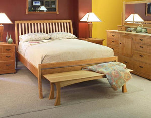 Artisan Sleigh Bed with Curved Legs in Natural Cherry with Curly Maple Slats shows custom bedroom furniture in Gainesville VA