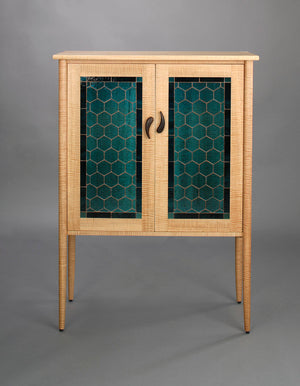 Library shown in Curly Maple with Art Glass, a Custom Sustainable Cabinet Design by Hardwood Artisans near Rappahannock VA