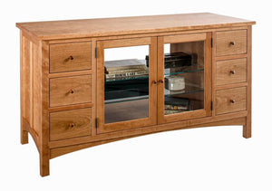 Craftsman TV Console in Natural Cherry features 6 drawers & 2 glass adjustable shelves behind frame and glass panel doors