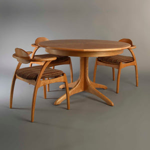 Walden Round Table shown with Linnaea Chairs and Upholstered Seats customized hardwood dining furniture Made in America