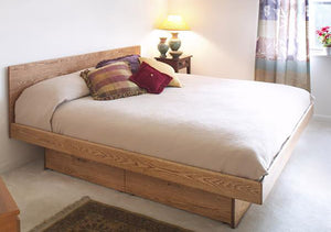 Platform Pedestal Bed with Basic Headboard in Red Oak hardwood bedroom furniture by Hardwood Artisans in Purcellville Virgina Artisans