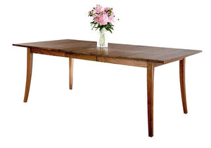 Simply Beautiful Table shown in Walnut is an extension table with elegance handmade using Amish joinery for strength & beauty
